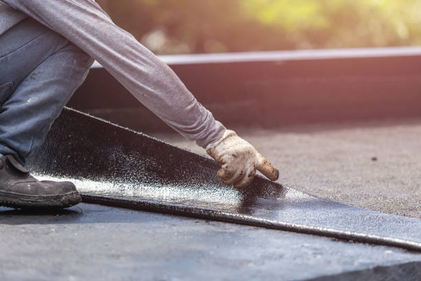 Professional Waterproofing technician working in Montrose, MI